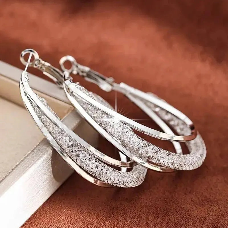 Aretes de Aro con Cristales Dorados - Diseño Trenzado Bañado en Plata para Mujer
