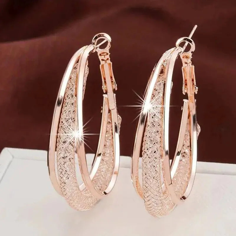Aretes de Aro con Cristales Dorados - Diseño Trenzado Bañado en Plata para Mujer